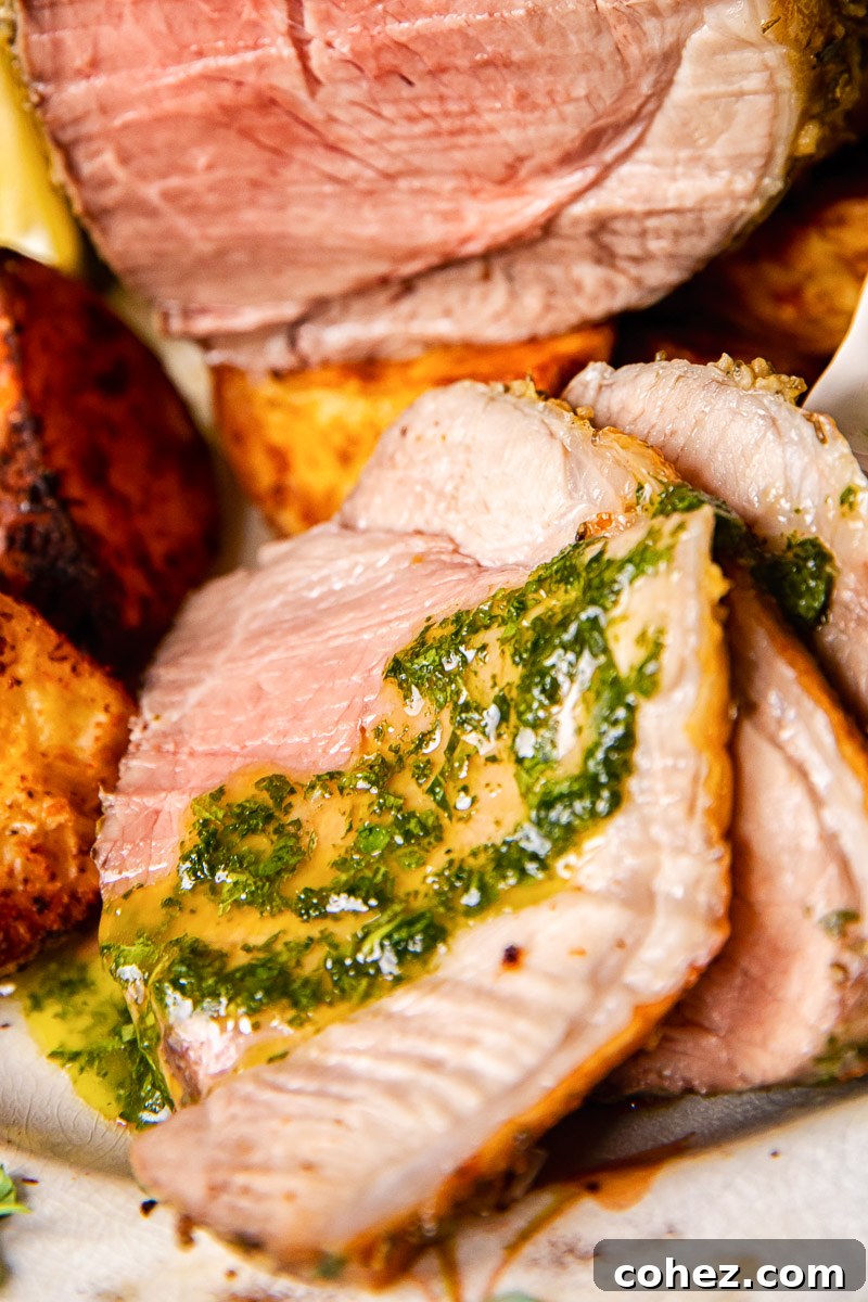 Tender Roast Leg of Lamb with Bright Mint Sauce 6 mint sauce spread over a slice of roast lamb