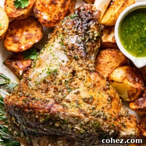 Tender Roast Leg of Lamb with Bright Mint Sauce 7 top down view of roast leg of lamb, mint sauce and roast potatoes