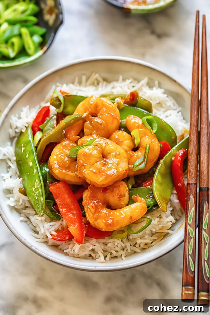 Sweet Heat Shrimp Stir-Fry 2 Top down shot of shrimp stir fry in a bowl with chopsticks