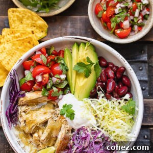 Fiesta Chicken Burrito Bowl 6 Top down shot of chicken and rice burrito bowls next to fresh veg and salsa toppings