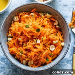 Top down shot of french carrot salad in a small bowl