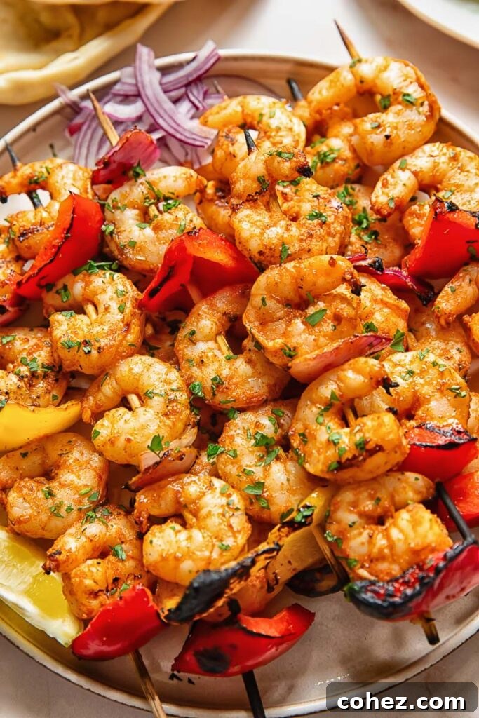Top down shot of shrimp kebabs on a platter