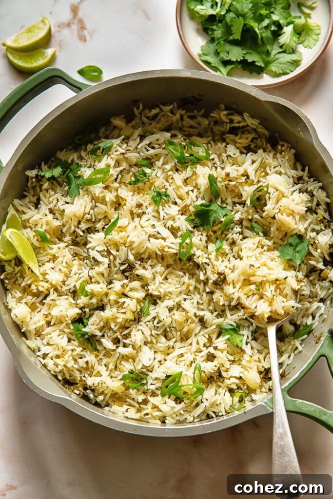 Zesty Cilantro Lime Rice 2 Top down shot of cilantro lime rice in a large pan