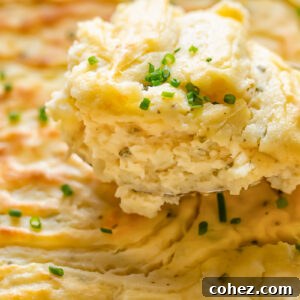 Golden Potato Cheese Cloud 5 Portion of potato soufflé with sprinklings of chives on top