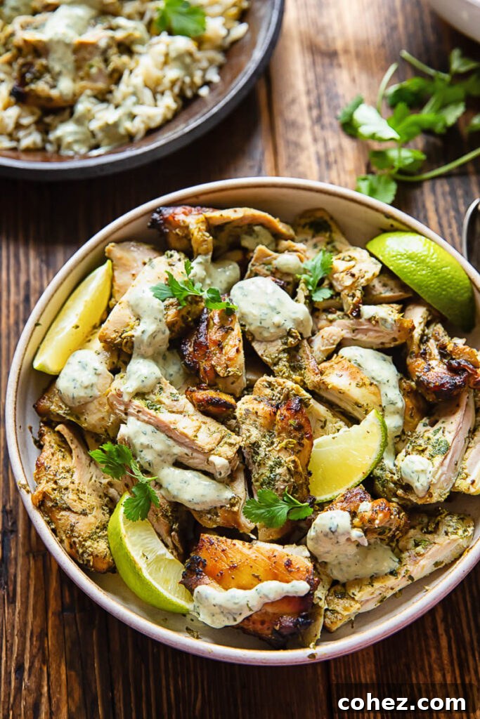 Top down shot of cilantro lime chicken in a bowl with creamy sauce