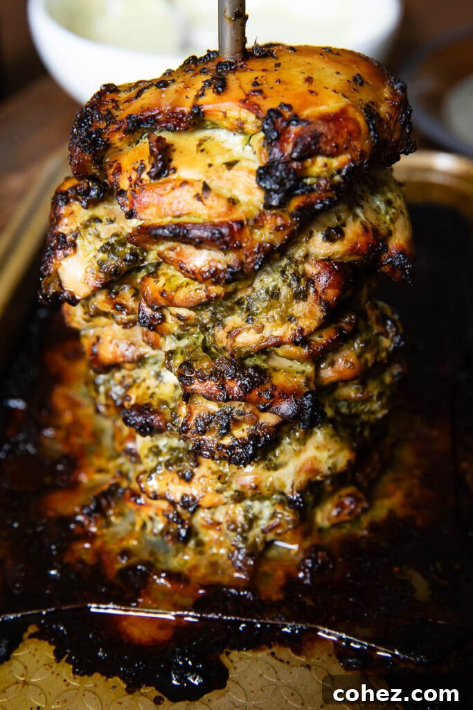 Close up shot of roasted cilantro lime chicken on a skewer