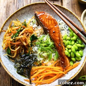 A colorful Teriyaki Salmon Donburi Bowl with rice, edamame, and vegetables