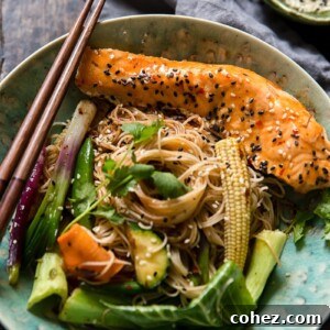 Bowl of fried noodles with vegetables and fish