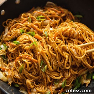 wok full of spicy peanut noodles
