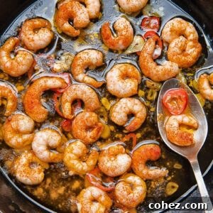 Close up shot of prawns with chilli oil in a pan