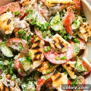 tomato and cucumber salad with grilled pita