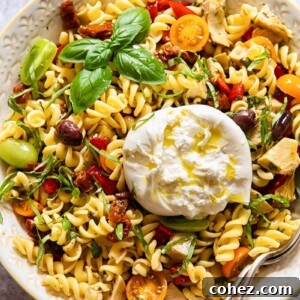 Pasta salad in a bowl with a spoon