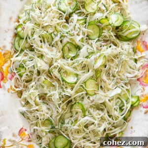 Top down shot of cabbage and cucumber slaw