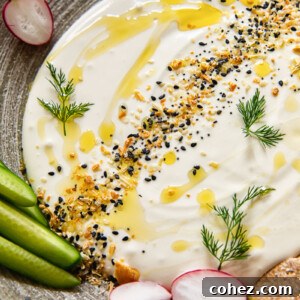 Close up of whipped feta dip with vegetables on a plate
