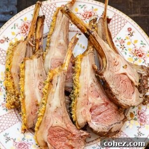 Rack of lamb pieces roasted with breadcrumbs on a plate